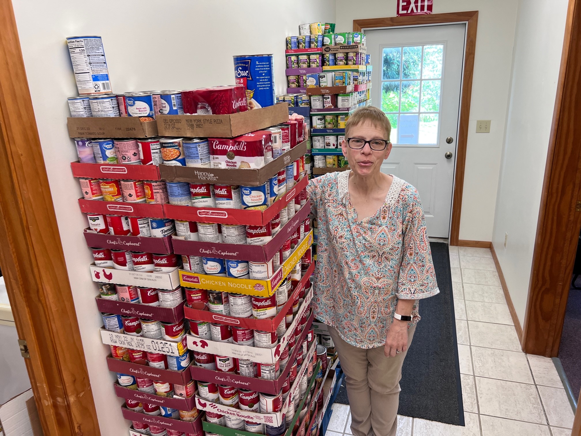 Community Action, Inc. Case Manager, Heather Reynolds, with the recent Clarion County Postal Workers Food Drive donations to the Clarion Food Pantry, located at 30A South Sheridan Road, Clarion, PA.